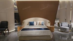 Beige Leather Upholstered Bed with Gold Stainless Steel Elephant Head Accents & Hammered Base Trim